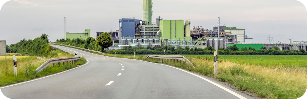 A factory next to a road