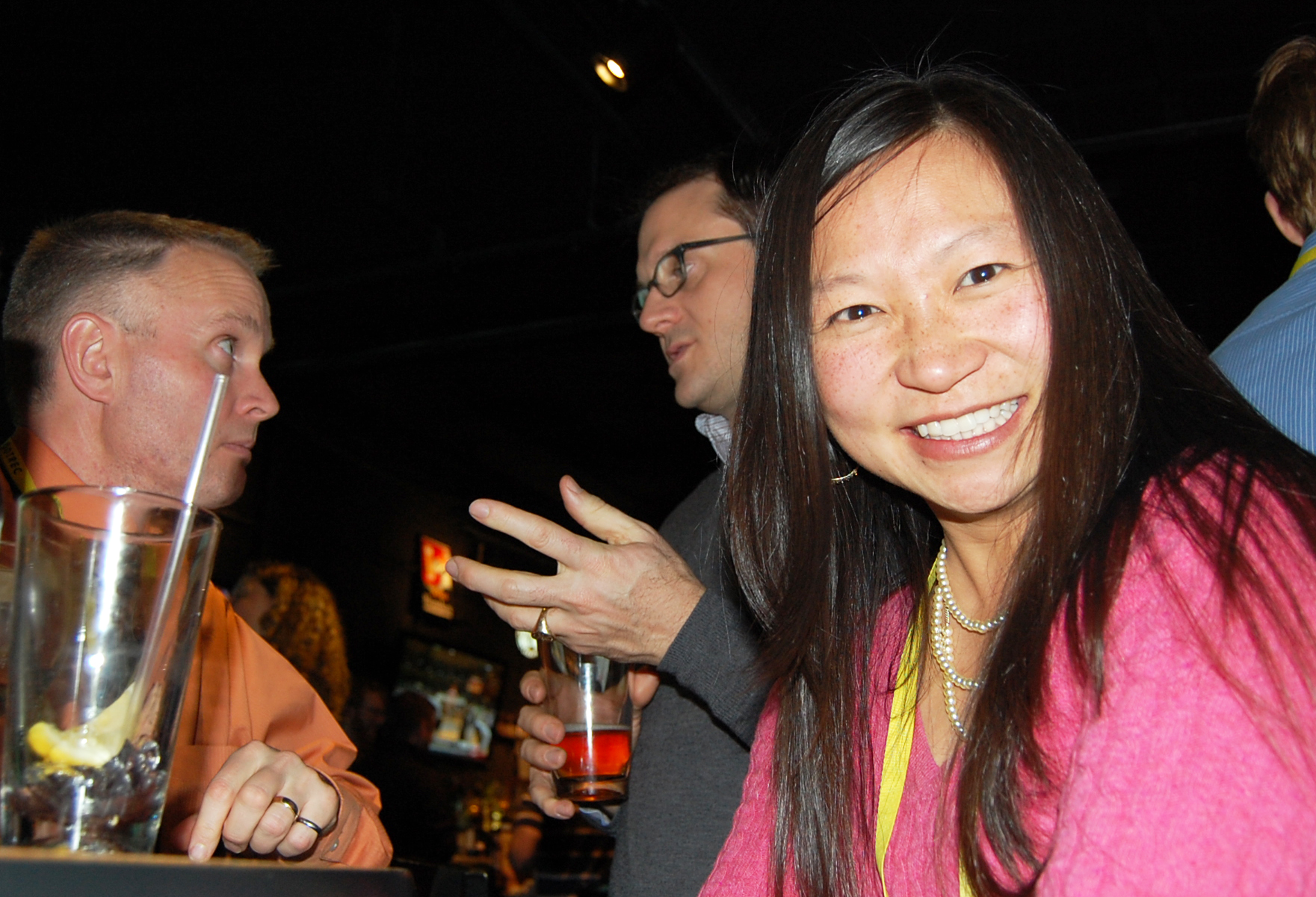 Hau at the 2012 TRB Reception, with TREC's John MacArthur and Roger Lindgren of Oregon Tech conversing in the background