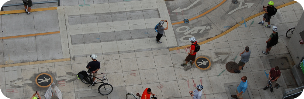 Aerial shot of people examining a walking and biking lane