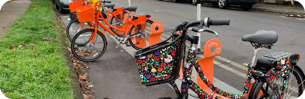 A row of Biketown bike share e-bikes