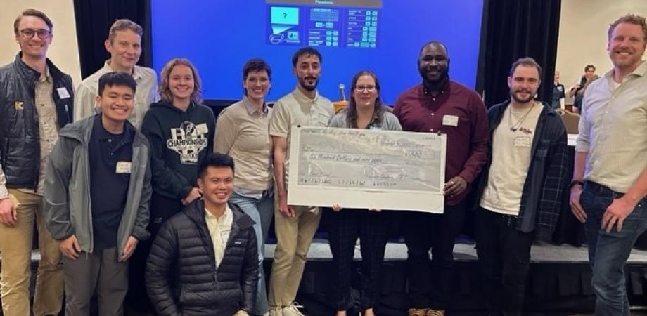 This picture shows the team, fellow PSU students, and ITE leaders with their $600 winner's check.